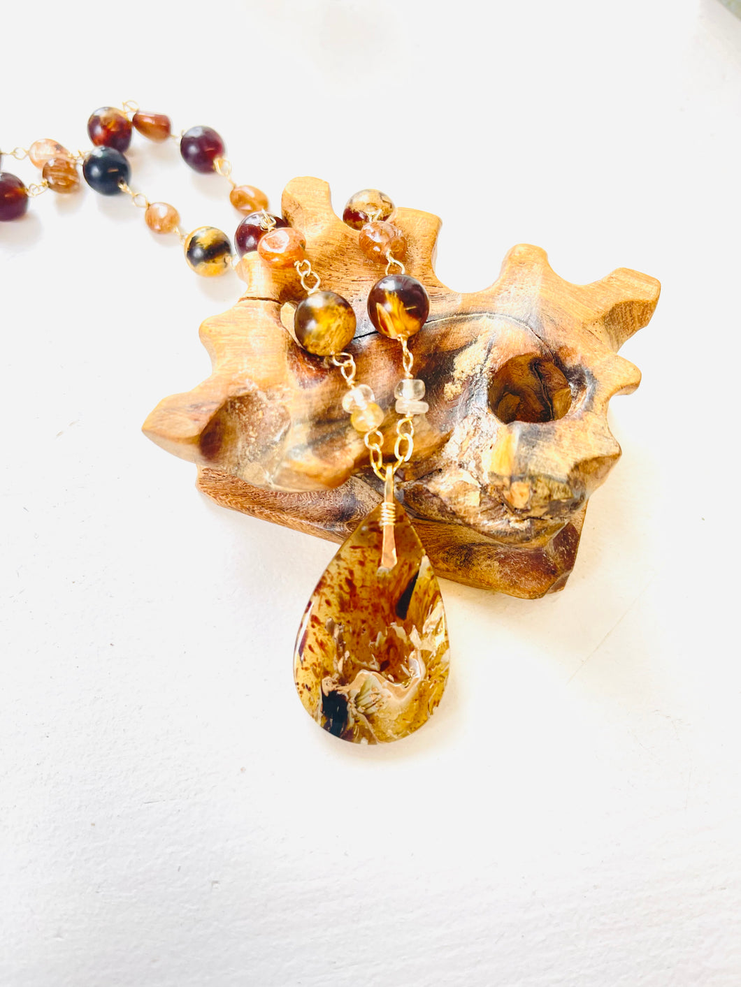 Necklace with Amber and Rutilated quartz beads