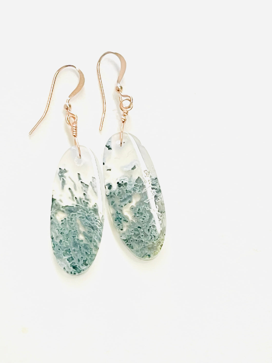 Earrings with translucent moss agate
