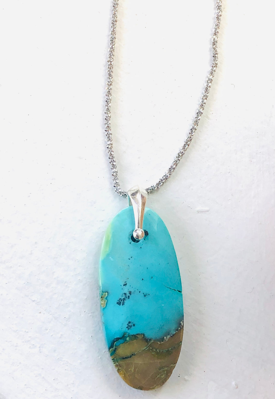 Pendant with opalized wood silica blue