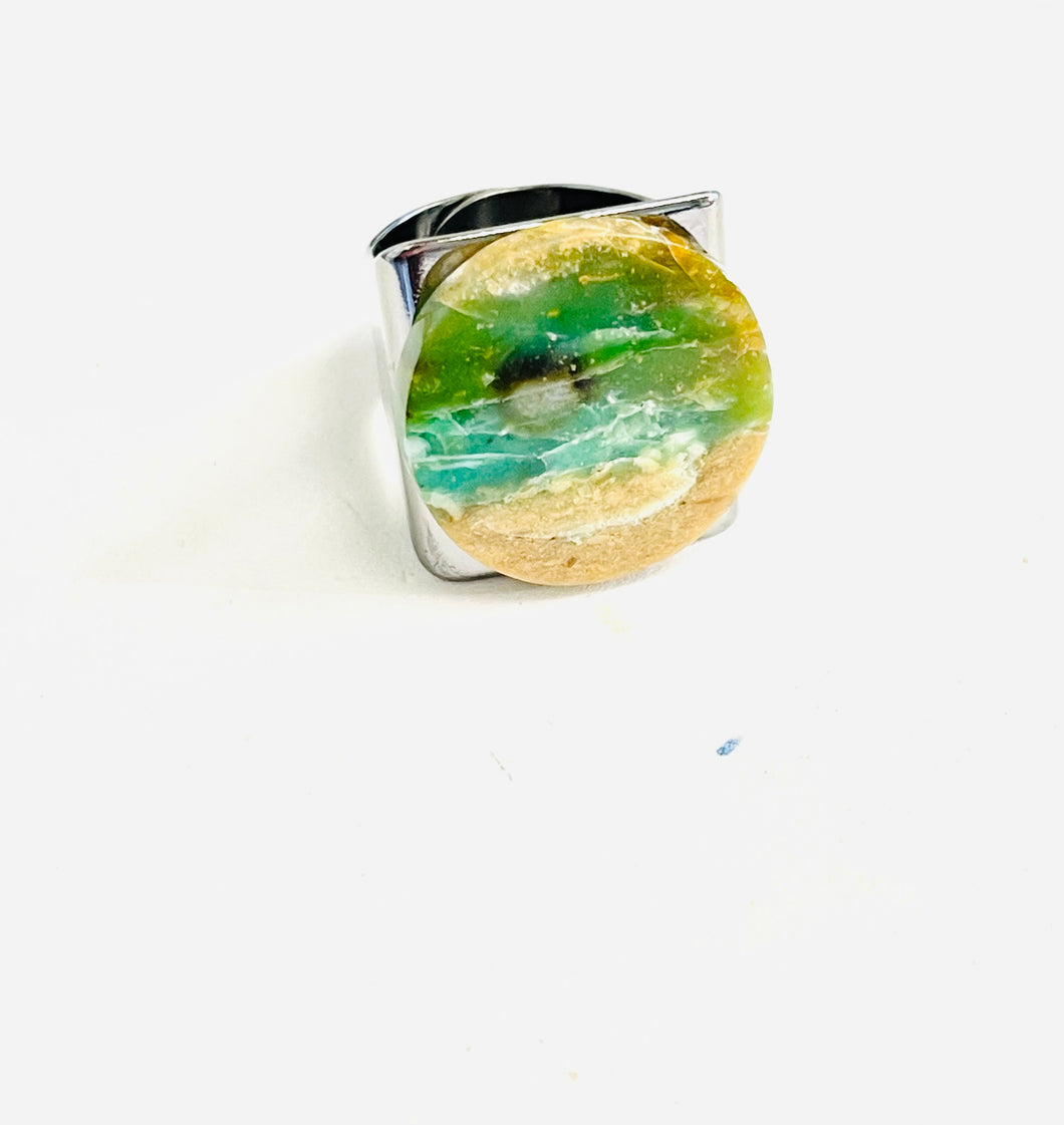 Ring with round opalized wood