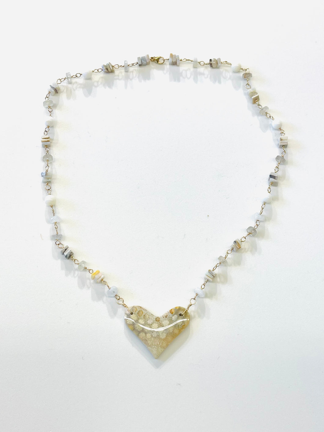 Necklace with white fossil coralligerous stones