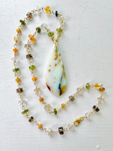 Necklace with long white opalized wood and various beads